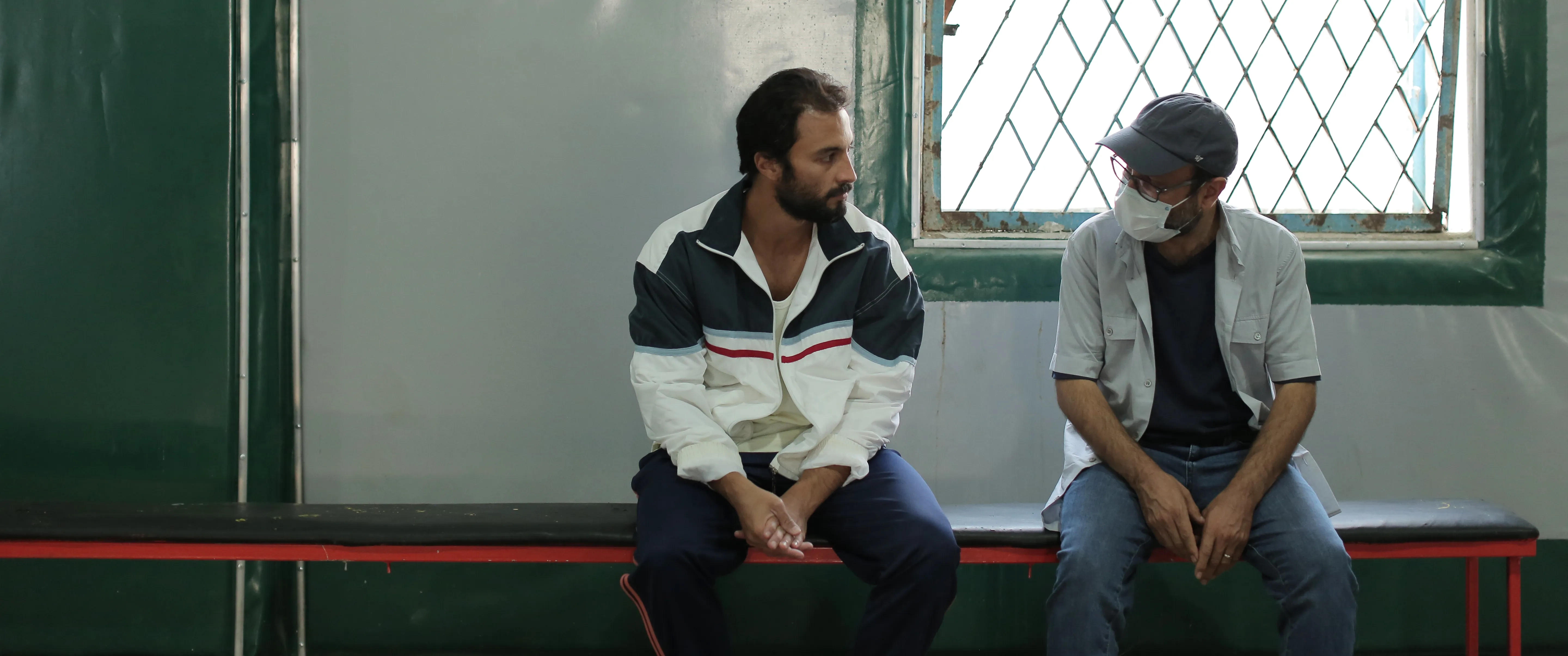 Asghar Farhadi and Amir Jadidi in A Hero (2021)