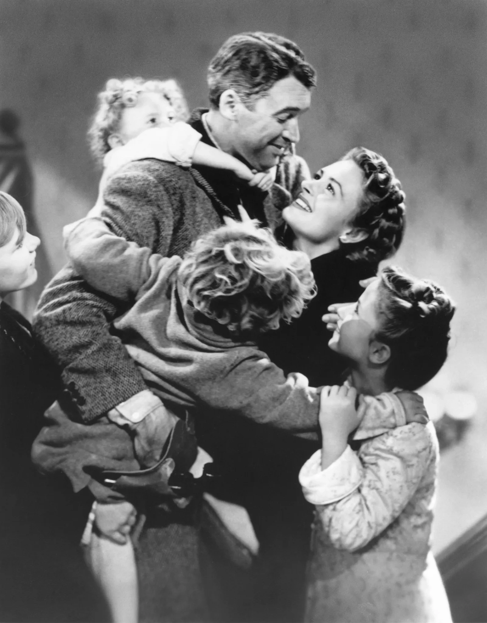 James Stewart, Donna Reed, Carol Coombs, Karolyn Grimes, Jimmy Hawkins, and Larry Simms in It's a Wonderful Life (1946)