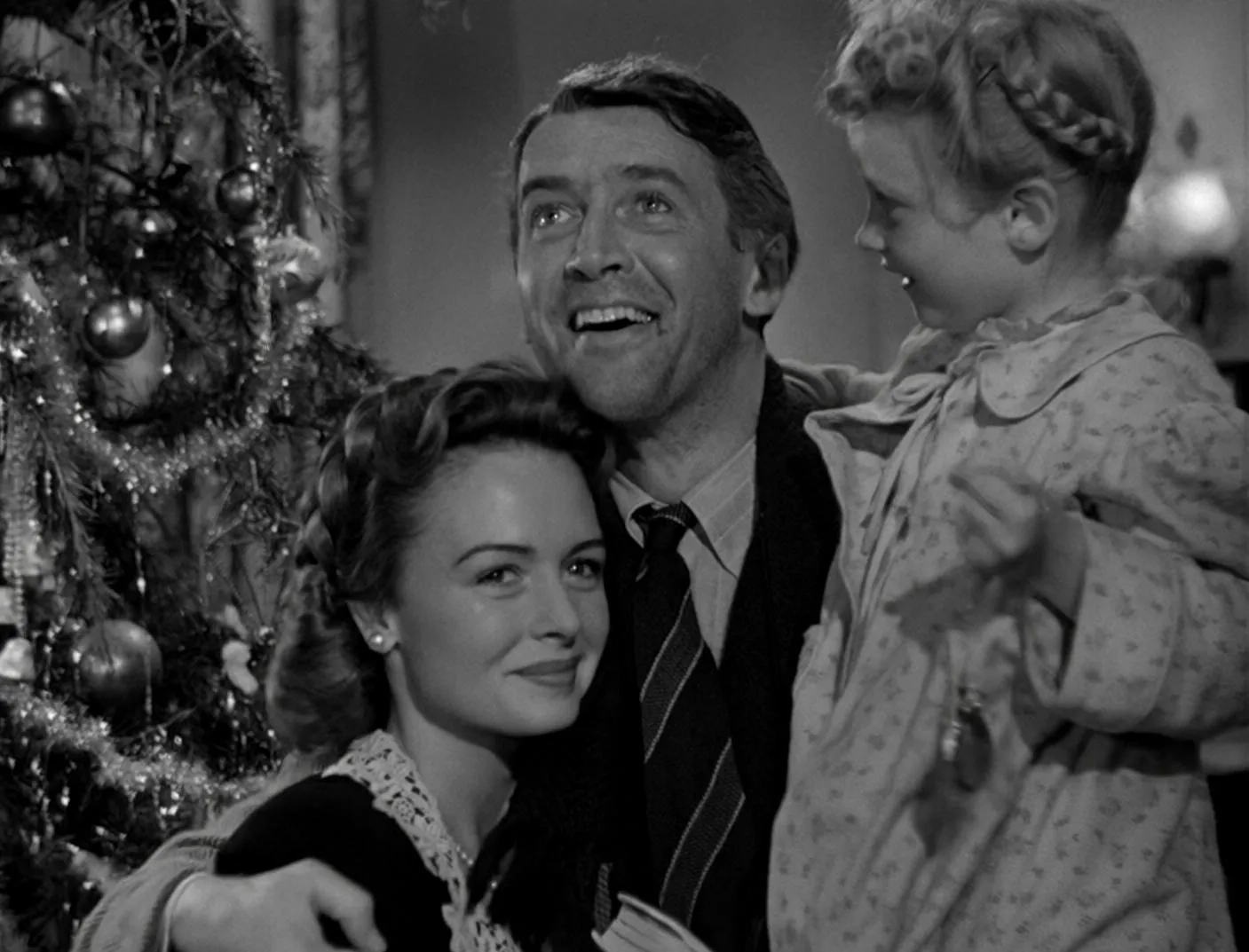 James Stewart, Donna Reed, and Karolyn Grimes in It's a Wonderful Life (1946)