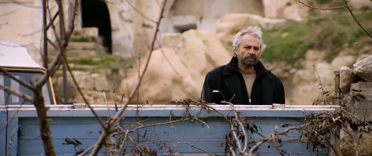 Haluk Bilginer in Winter Sleep (2014)