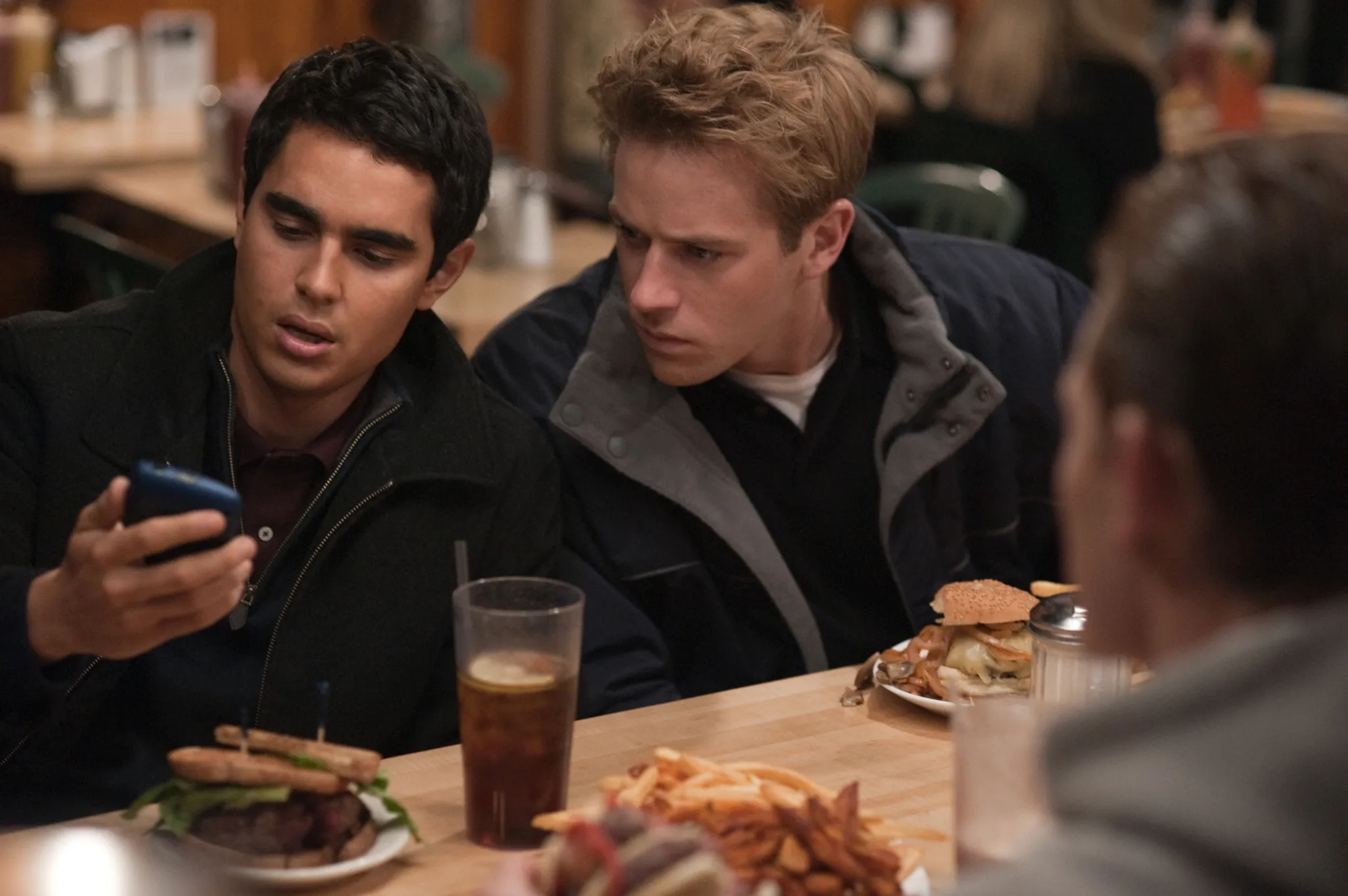 Max Minghella, Armie Hammer, and Josh Pence in The Social Network (2010)