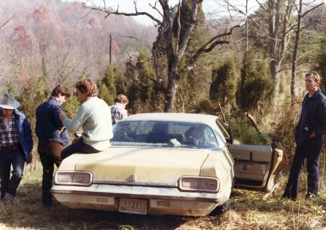 Bruce Campbell and Richard DeManincor in The Evil Dead (1981)