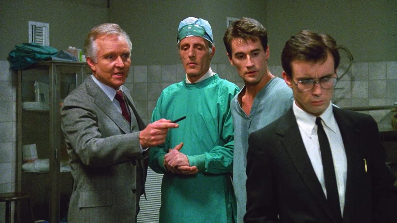 Jeffrey Combs, Bruce Abbott, David Gale, and Robert Sampson in Re-Animator (1985)