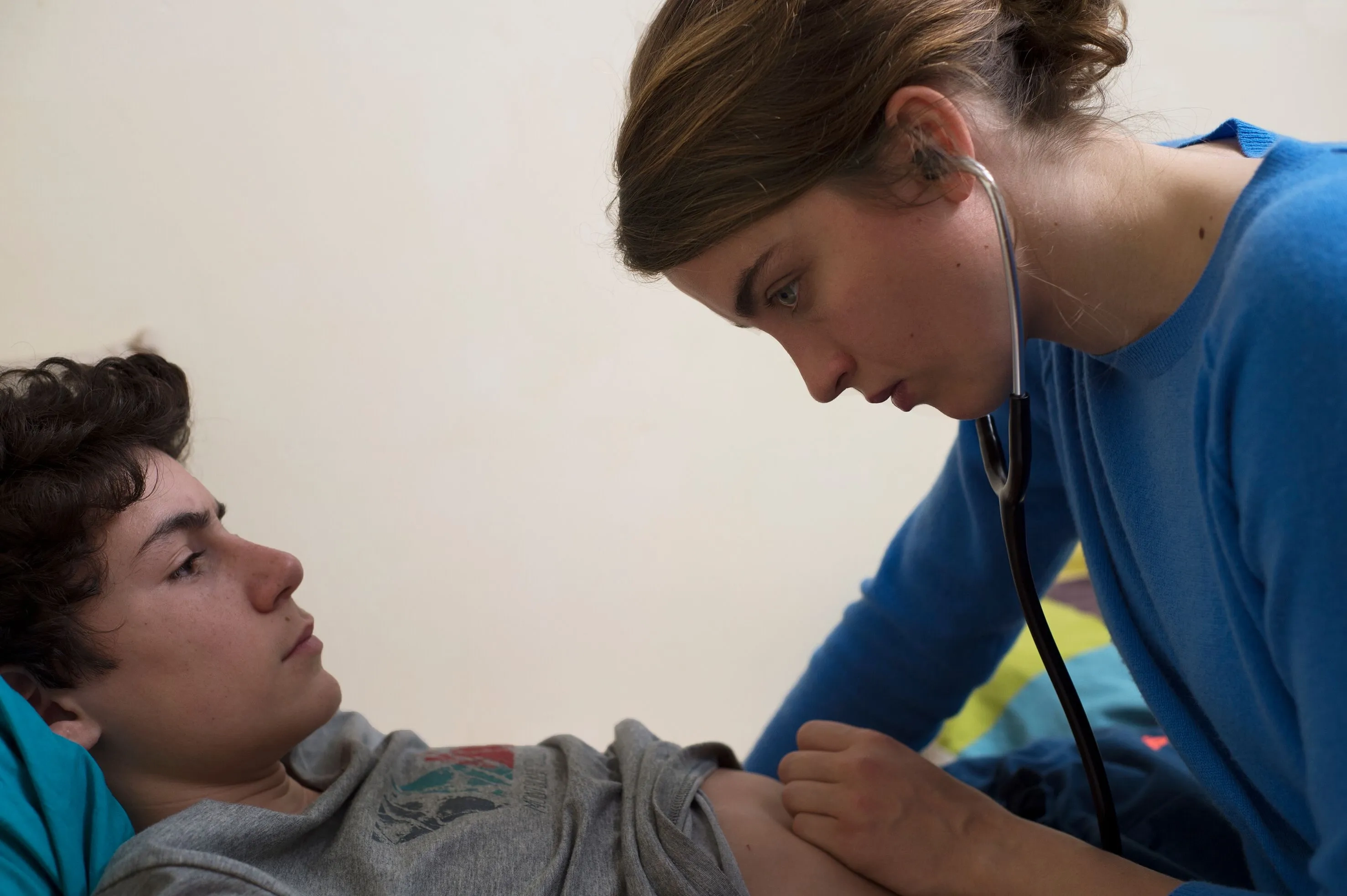 Adèle Haenel and Louka Minnella in The Unknown Girl (2016)