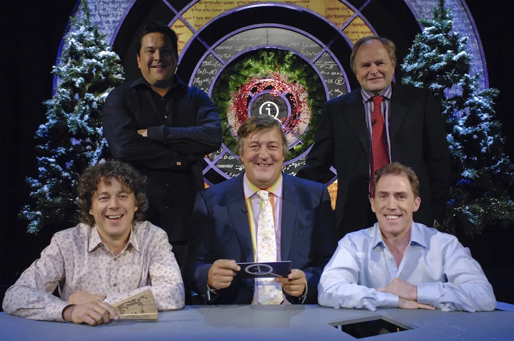 Stephen Fry, Clive Anderson, Rob Brydon, Alan Davies, and Dom Joly in QI (2003)