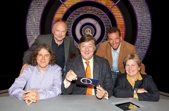 Stephen Fry, Clive Anderson, Alan Davies, Sandi Toksvig, and Henning Wehn in QI (2003)