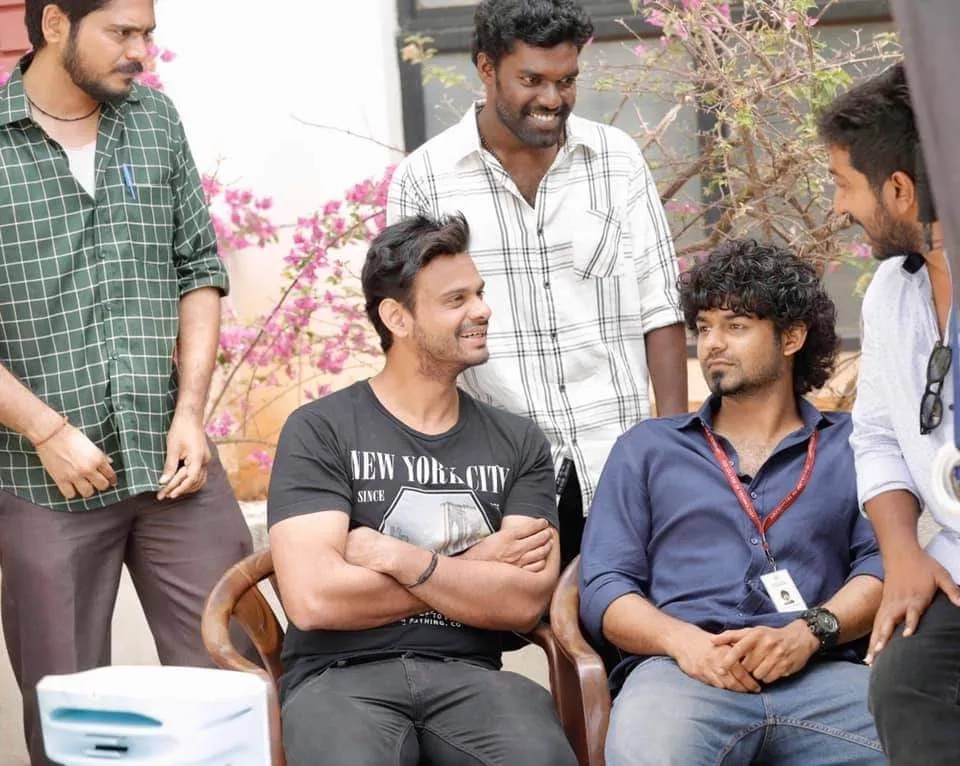 Aswath Lal, Vineeth Sreenivasan, Pranav Mohanlal, Kalesh Ramanand, and Visakh Subramaniam in Hridayam (2022)