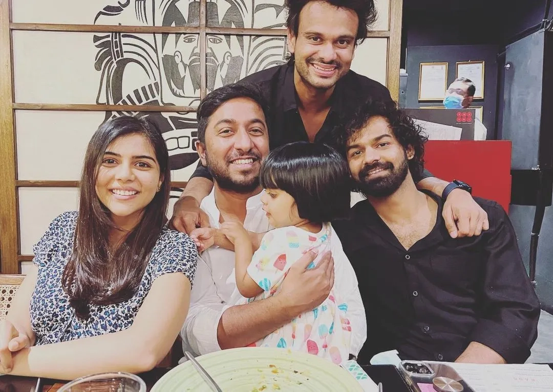 Vineeth Sreenivasan, Pranav Mohanlal, Visakh Subramaniam, and Kalyani Priyadarshan in Hridayam (2022)