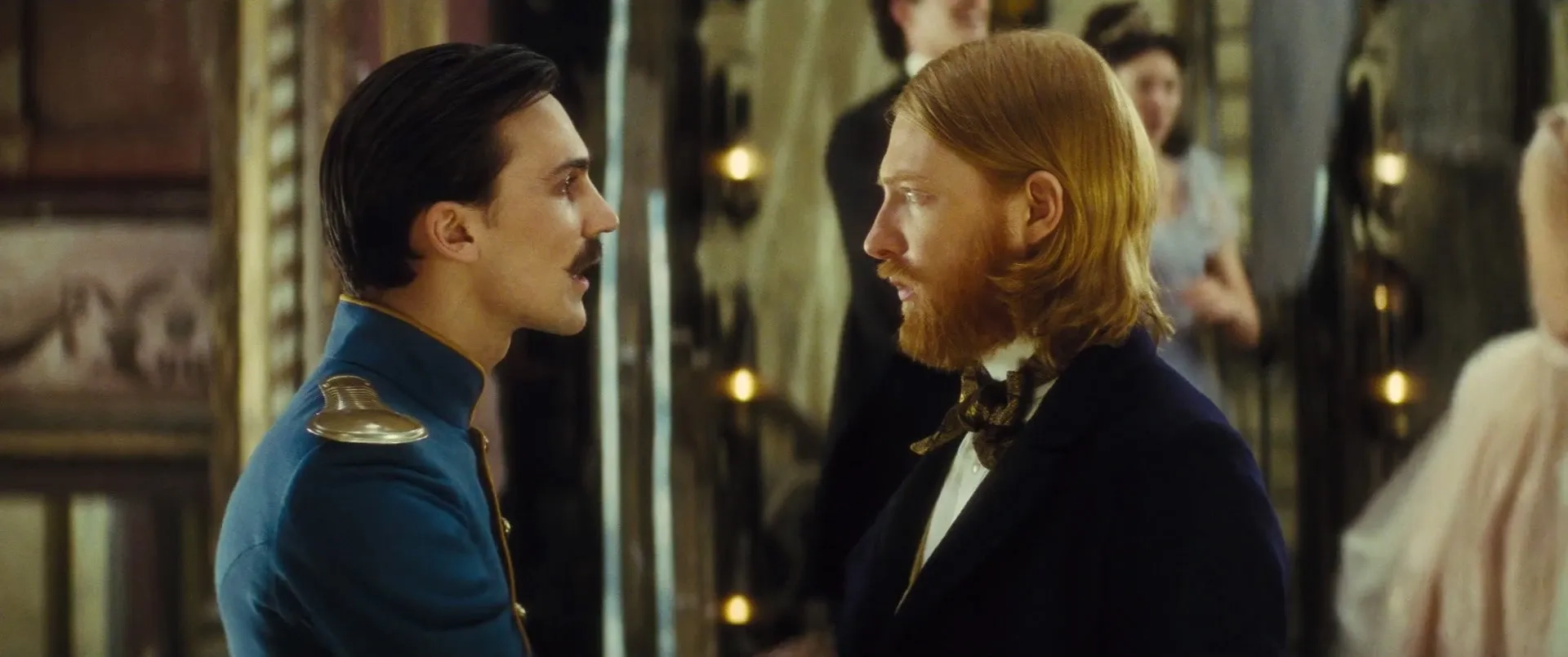 Henry Lloyd-Hughes and Domhnall Gleeson in Anna Karenina (2012)